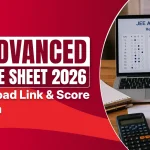 "JEE Advanced 2026 Response Sheet – Best Coachings in Sikar. Laptop screen showing official JEE Advanced response sheet with 145 total score and 98.76 percentile. Includes Physics, Chemistry & Mathematics books, calculator, score calculation formula (Score = 3×Correct – 1×Incorrect), and direct download link. Perfect for JEE aspirants checking results."
