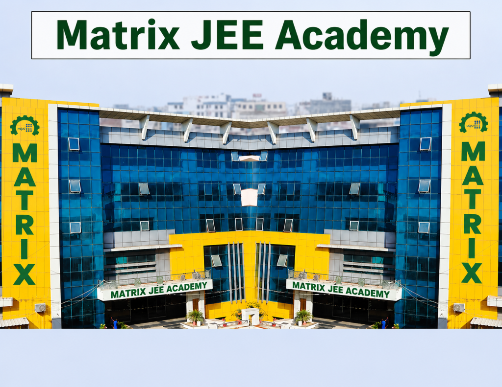 Matrix JEE Division building in Sikar, Rajasthan. A modern multi-story glass facade building in yellow and blue colors with prominent "MATRIX JEE Academy" signage, showcasing the institute's infrastructure for JEE preparation.