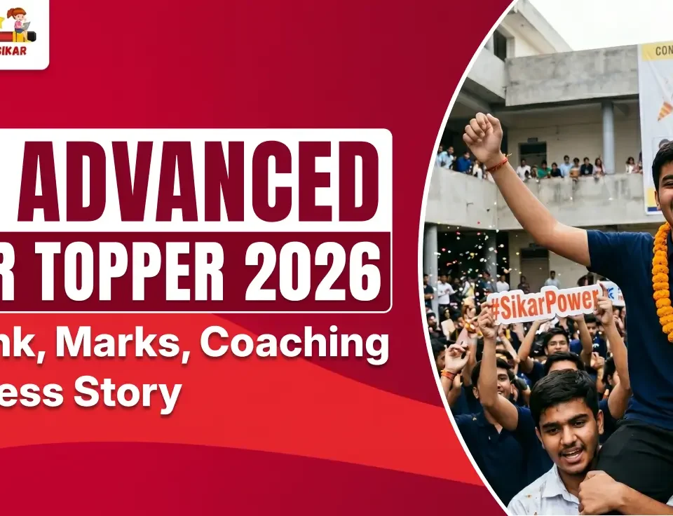 "JEE Advanced Sikar Topper 2026 celebration poster featuring a joyful student wearing orange marigold garlands being carried by friends, with a large crowd cheering in the background. Text highlights 'JEE Advanced Sikar Topper 2026' along with AIR Rank, Marks, Coaching & Success Story."