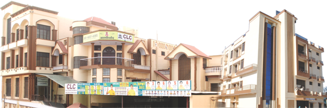 CLC Coaching Institute building in Sikar, Rajasthan. A large multi-story campus with beige and brown architectural design, prominent CLC signage and banners on the facade, showcasing the institute's infrastructure for competitive exam preparation.